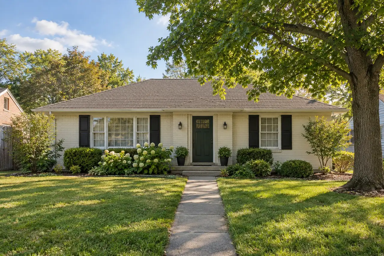 Illustrative scene: a modest, well-kept older home with a green front door in morning light